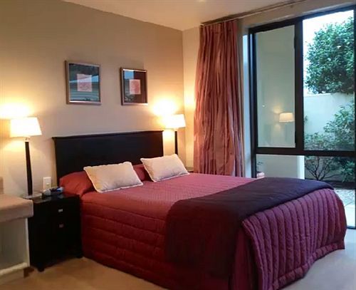 Palazzo Motor Lodge Nelson Luaran gambar A bedroom